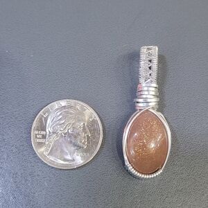 Silver Pendant with Brown Stone